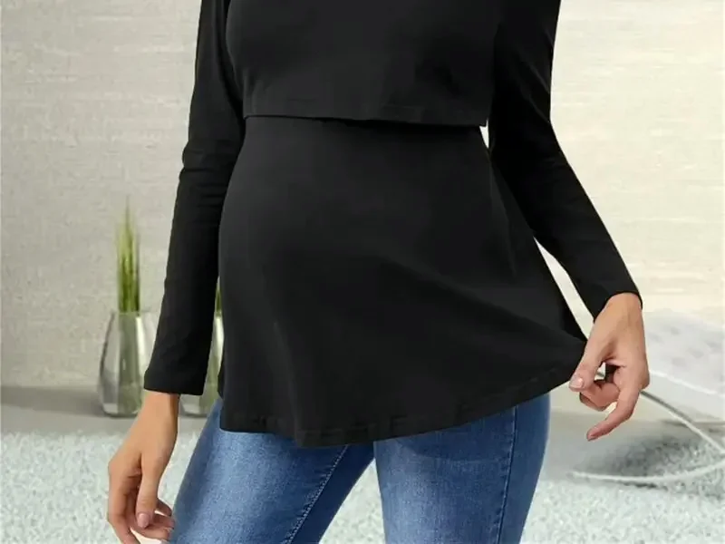 Extended front-rise maternity top showing level hem balance