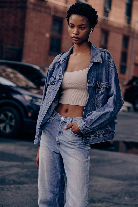 Full-length finished jacket on a model — complete figure, head included