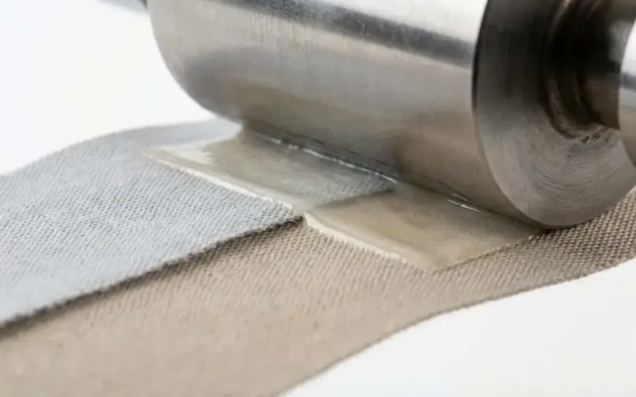 Bonded seam being heat-pressed onto activewear fabric