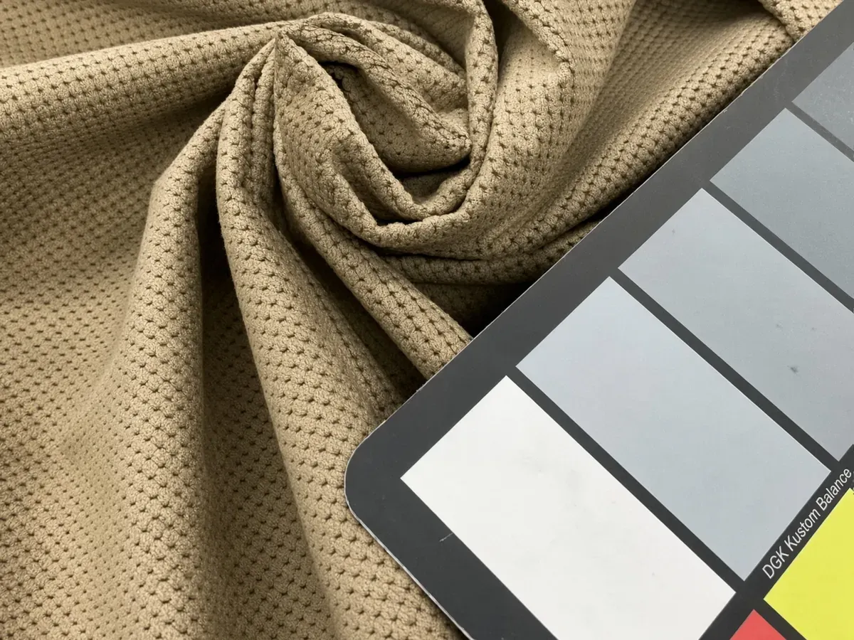 Microfiber blend fabric swatch with a colour card