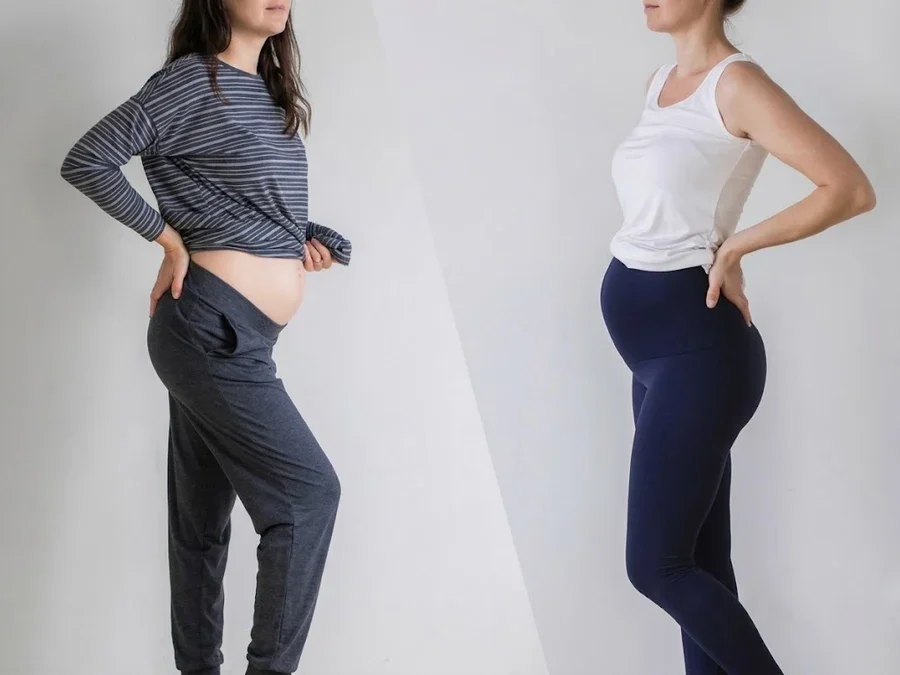 Two maternity support pants sized to the growing bump