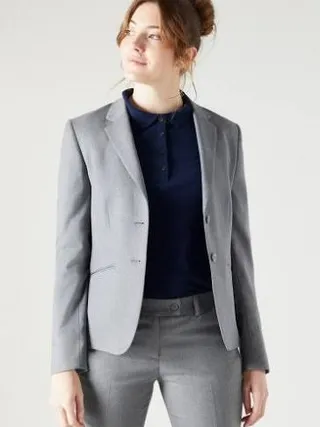 Office staff in corporate uniform — modern workplace