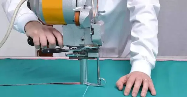 Fabric cutting on the production line for custom underwear