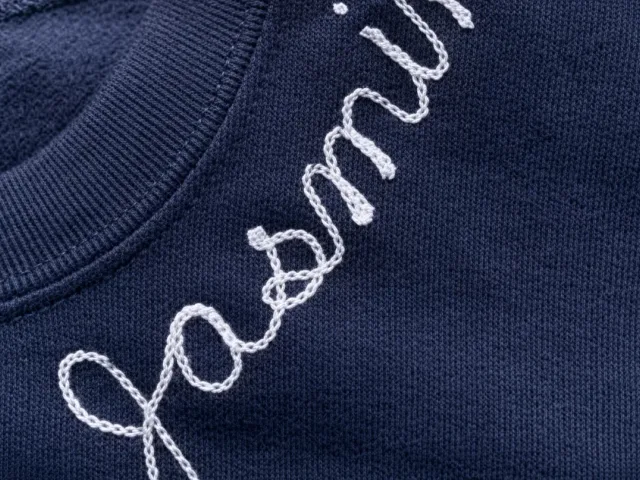 Chain stitch embroidery on a heavyweight garment