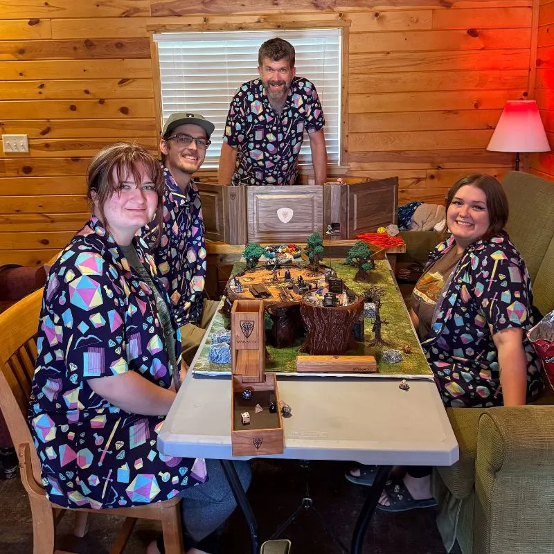 Friends playing board games in bright Hawaiian shirts at a house party